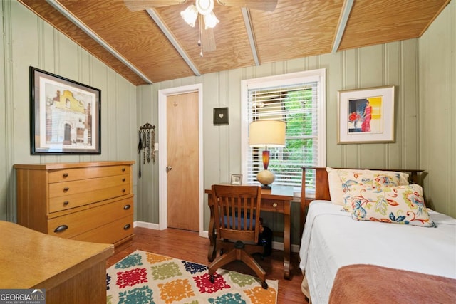 bedroom featuring wood ceiling, wood-type flooring, and vaulted ceiling