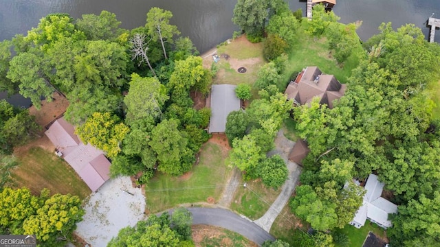 drone / aerial view with a water view