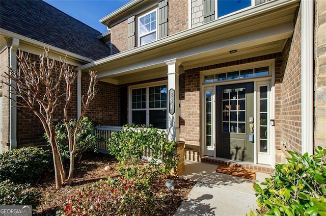 doorway to property with a porch