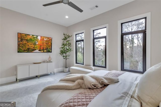 carpeted bedroom with ceiling fan