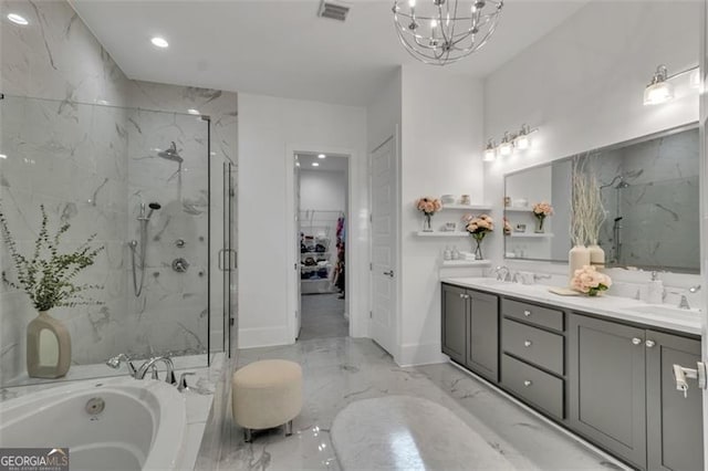 bathroom featuring vanity and independent shower and bath