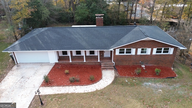 ranch-style house featuring a garage