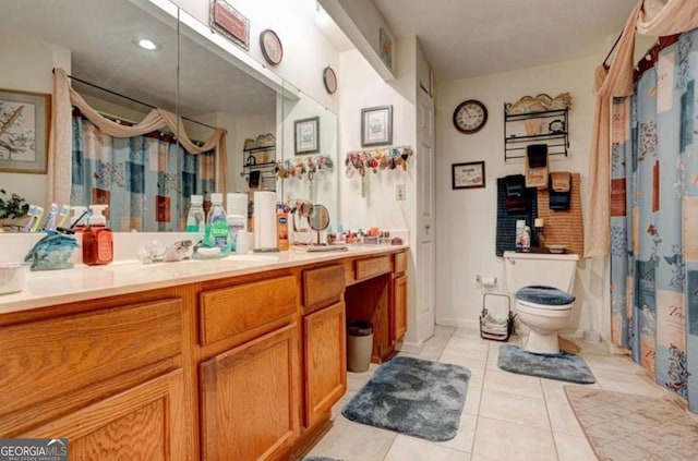 bathroom with vanity, a shower with shower curtain, tile patterned floors, and toilet