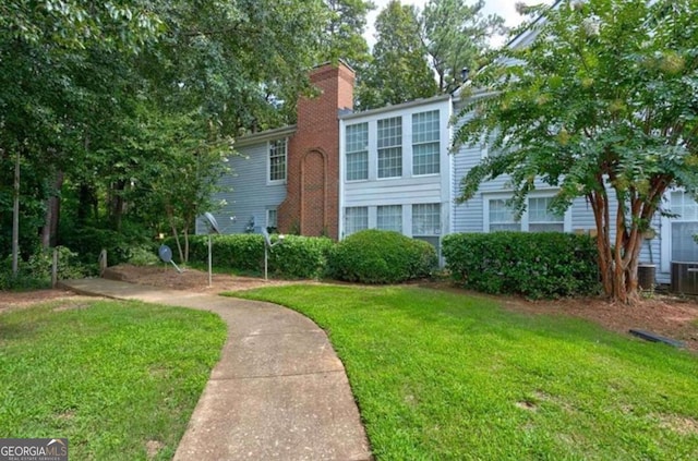 exterior space with a front yard