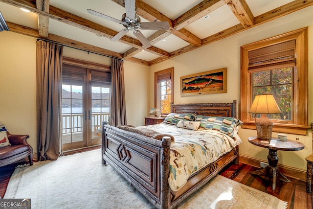 bedroom featuring hardwood / wood-style floors, beamed ceiling, coffered ceiling, access to outside, and french doors