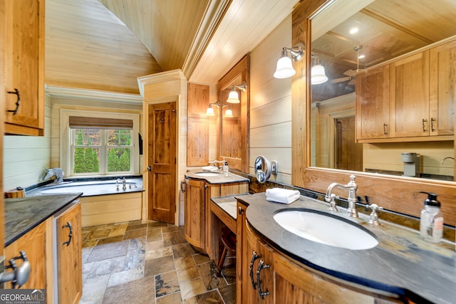 bathroom featuring a bathing tub, wood walls, vanity, wood ceiling, and crown molding