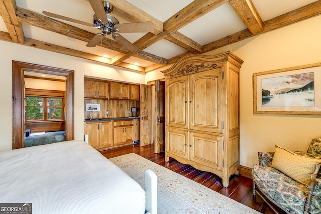 bedroom with beamed ceiling, coffered ceiling, and dark hardwood / wood-style floors