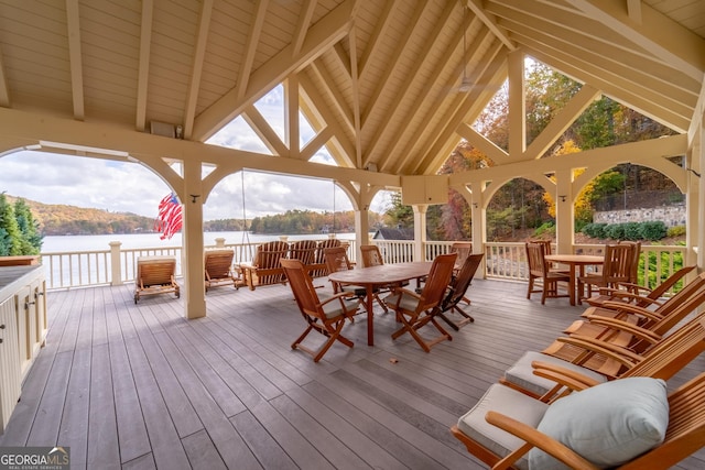 deck with a water view and a gazebo