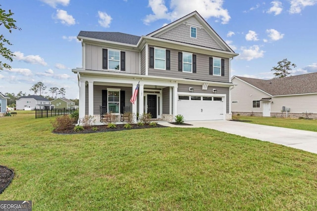 craftsman-style house featuring a porch, a garage, and a front lawn