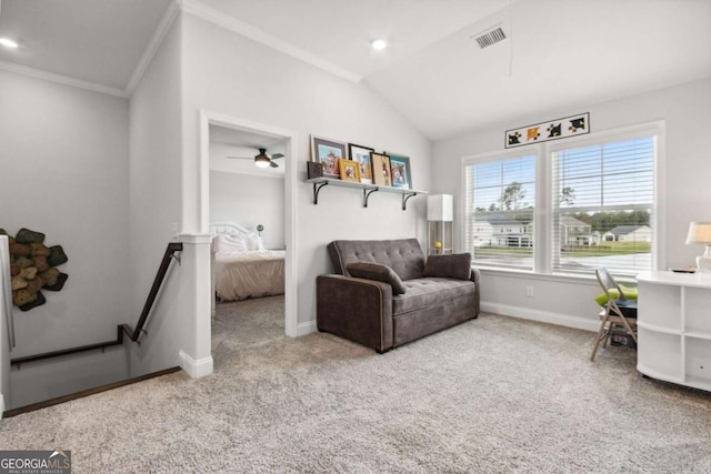 living area featuring lofted ceiling, crown molding, and carpet