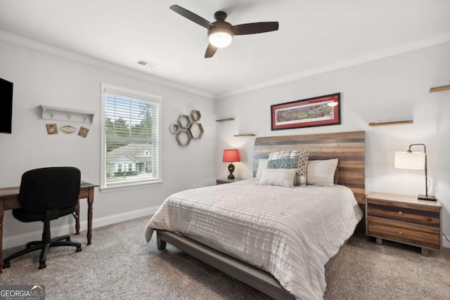 carpeted bedroom with crown molding and ceiling fan