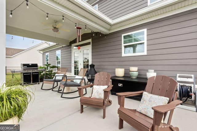 view of patio / terrace featuring ceiling fan and a grill