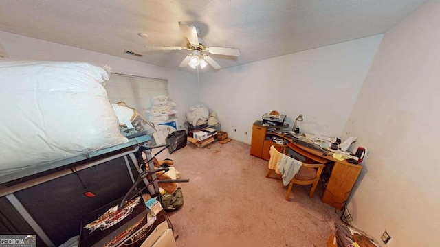 miscellaneous room featuring light colored carpet and ceiling fan