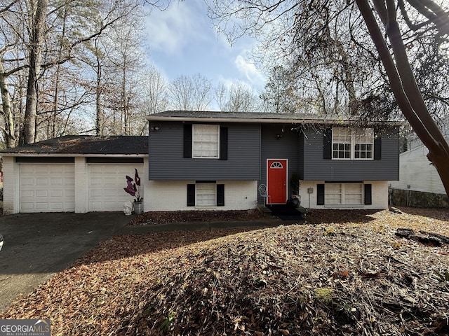 bi-level home featuring a garage