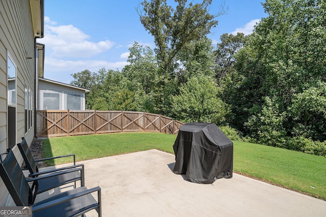 view of patio with a grill