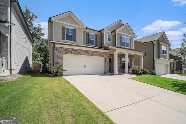 view of front of home with a porch, a garage, and a front lawn