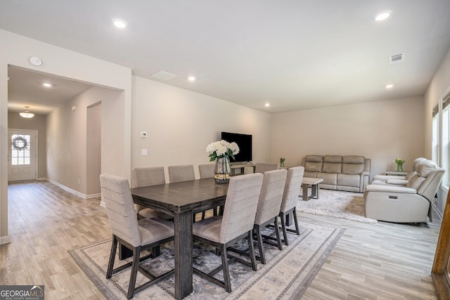 dining room featuring light wood-type flooring