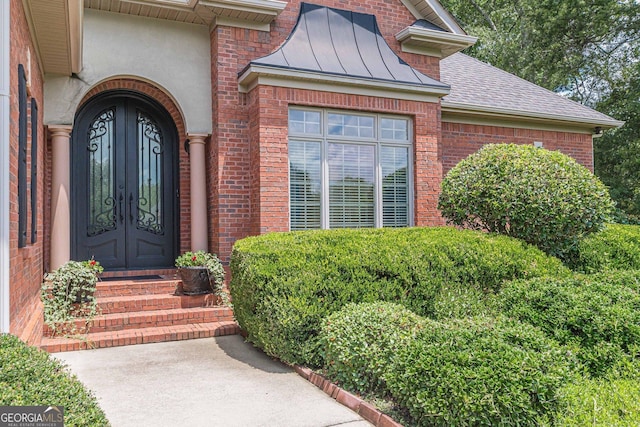 doorway to property featuring french doors