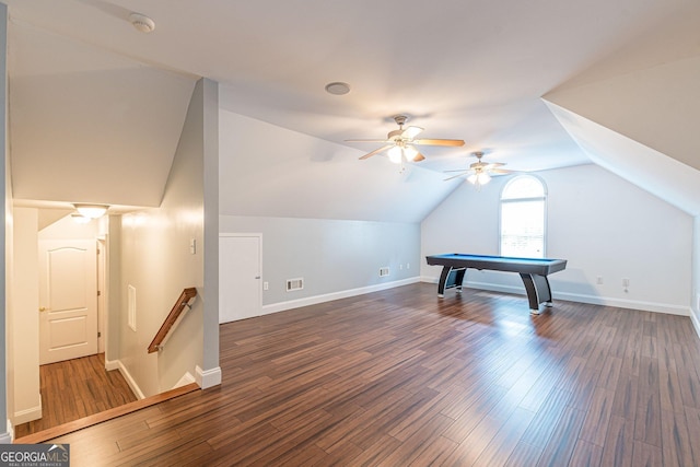 additional living space with dark wood-type flooring, billiards, and vaulted ceiling