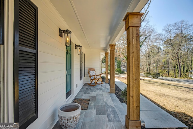 view of patio featuring a porch