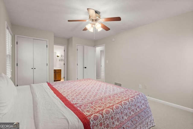 bedroom with ceiling fan and carpet