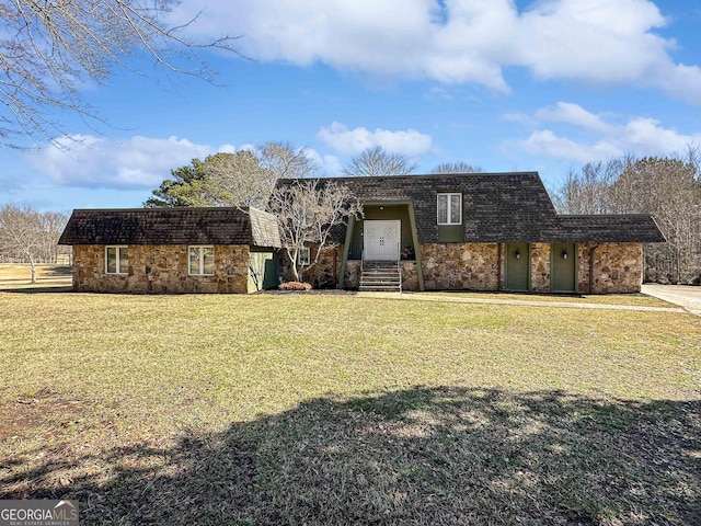 front facade with a front lawn