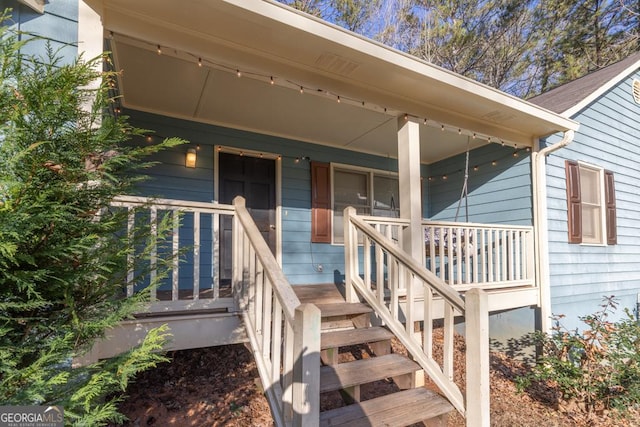 doorway to property with a porch