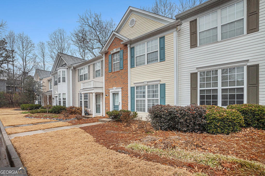 3712 Berkeley Xing, Duluth, GA 30096 - view of front of property with a residential view and brick siding