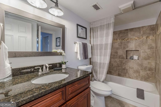 full bathroom with shower / bath combination with curtain, tile patterned floors, toilet, and vanity