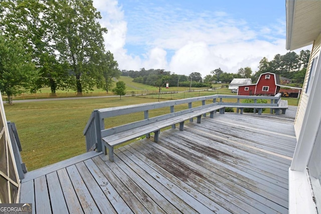 wooden deck with a yard