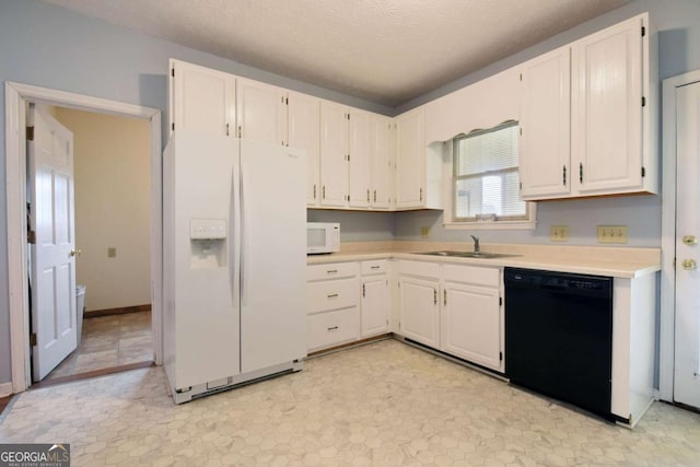 kitchen with white cabinetry, sink, white appliances, and a textured ceiling