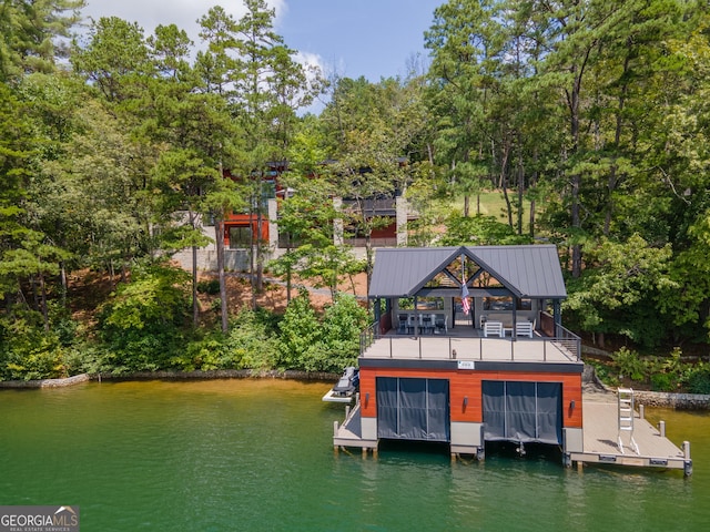 dock area with a water view