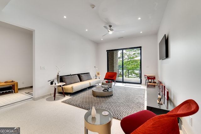 living room featuring ceiling fan