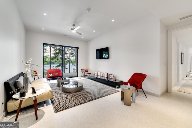 living room with ceiling fan