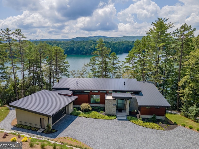 view of front of home featuring a water view