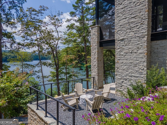 view of patio / terrace with a water view