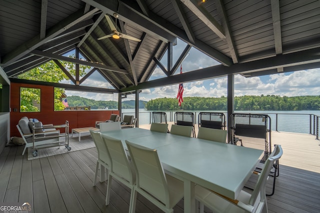 wooden deck featuring a gazebo and a water view