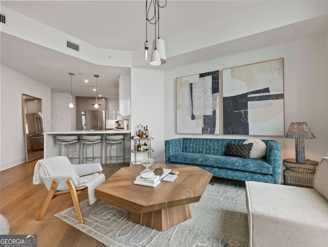 living room with wood-type flooring