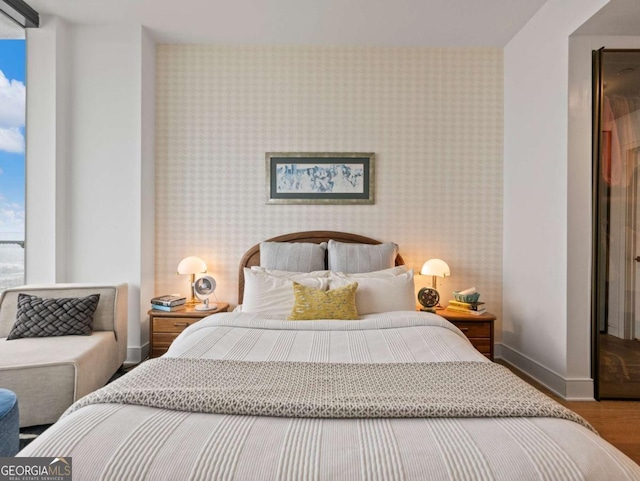 bedroom featuring hardwood / wood-style flooring