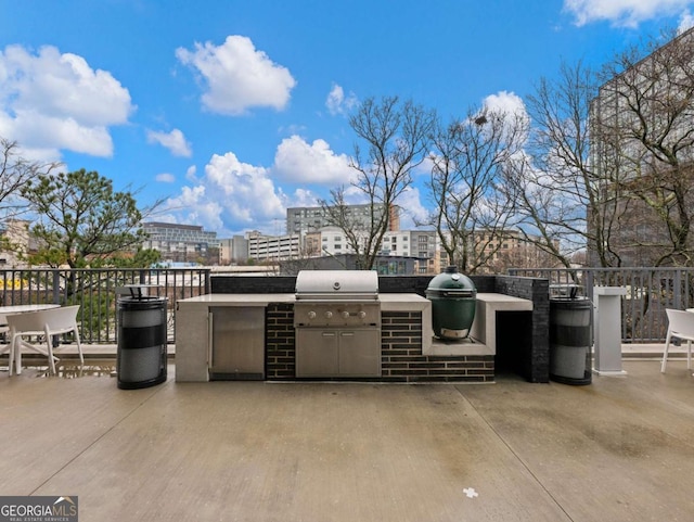 view of patio / terrace with area for grilling and exterior kitchen