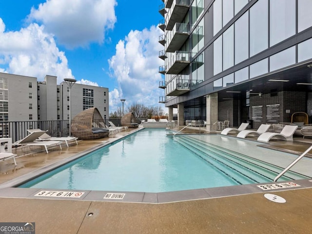 view of pool with a patio