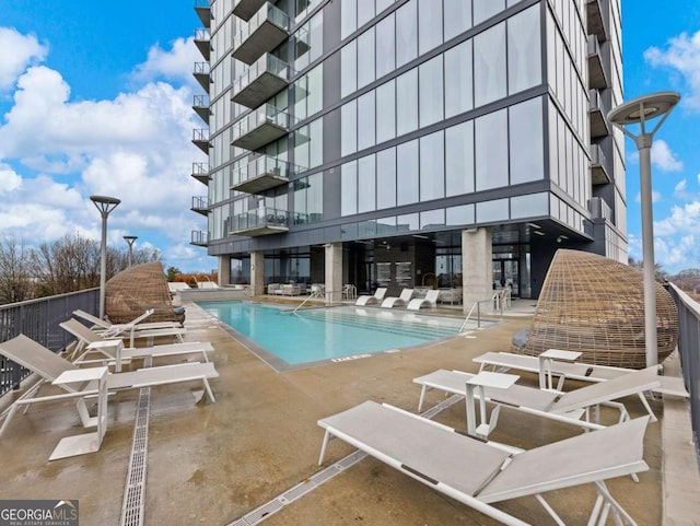 view of pool with a patio area