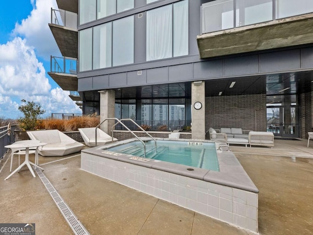 view of pool featuring a patio area