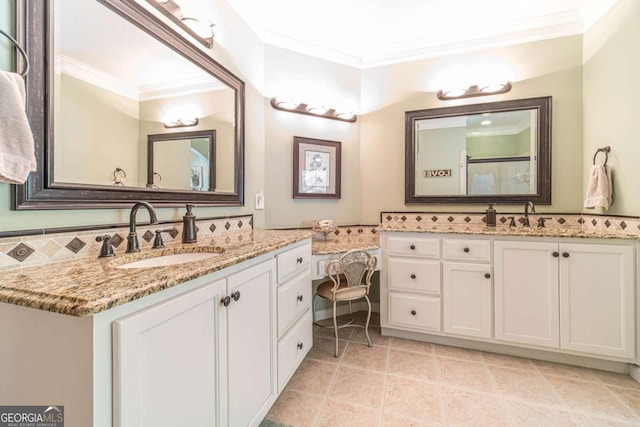 bathroom featuring an enclosed shower, ornamental molding, vanity, and tile patterned floors