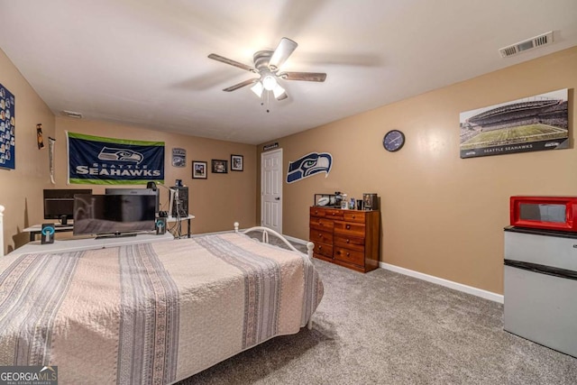 carpeted bedroom featuring ceiling fan