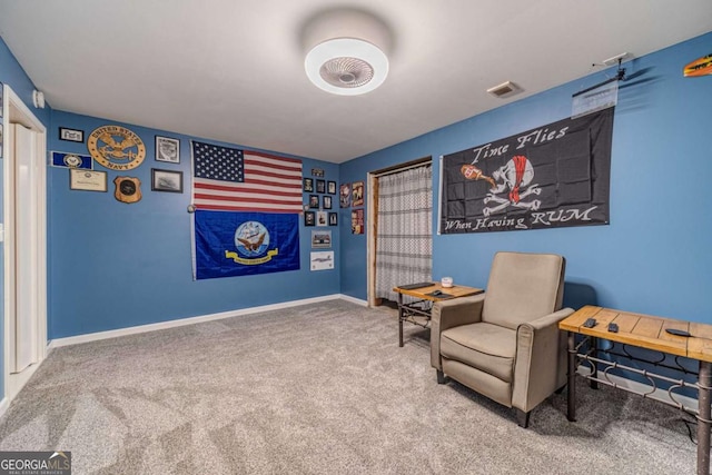 living area with carpet floors