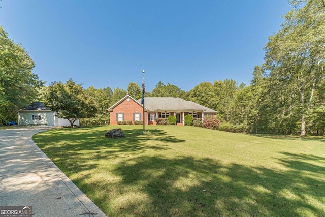 ranch-style house with a front yard