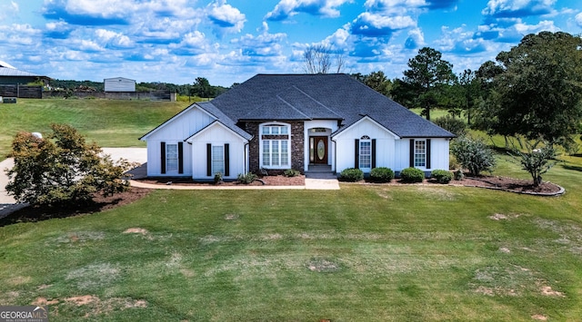 view of front of property with a front lawn