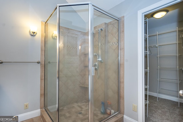 bathroom featuring walk in shower