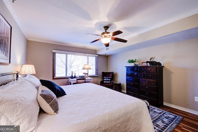 bedroom with ceiling fan, ornamental molding, and hardwood / wood-style floors